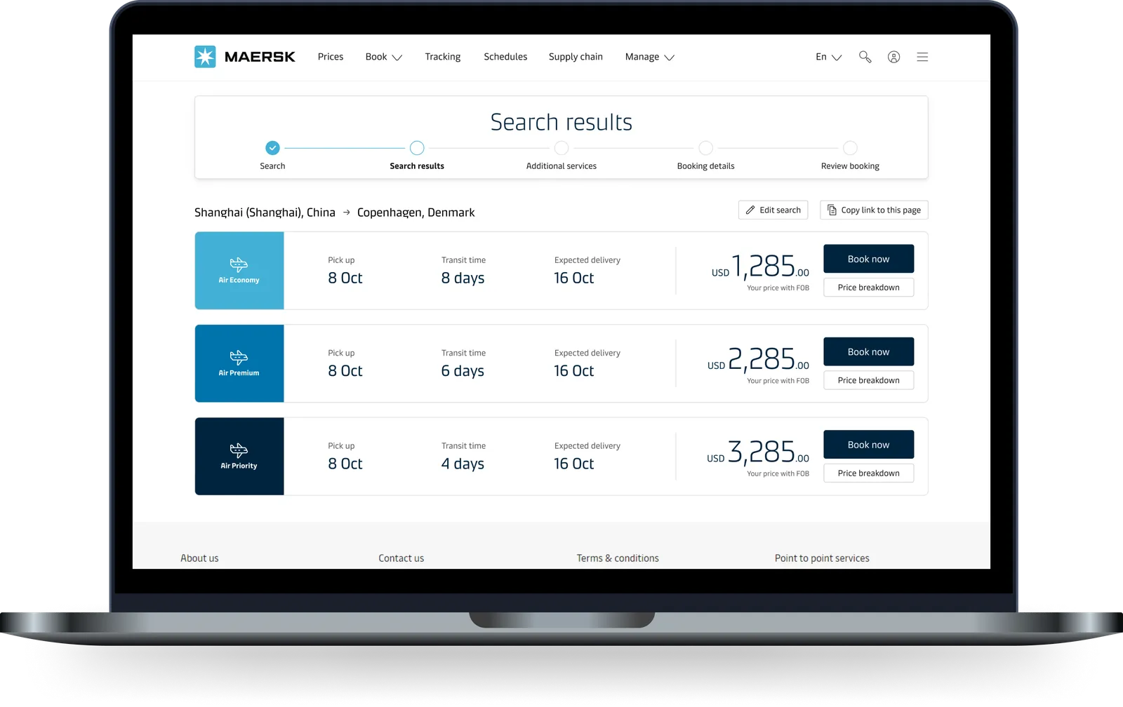 Maersk air-booking search results shown on a laptop